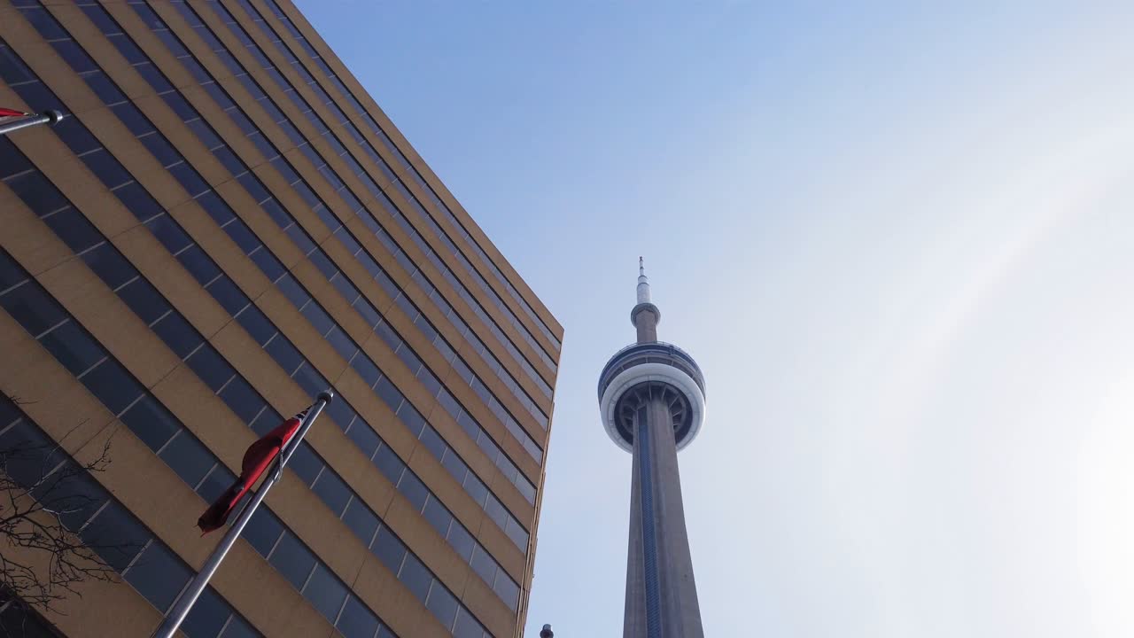 Toronto skyline viewed across the city at dusk.